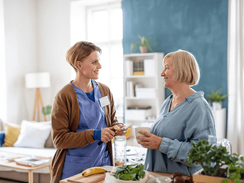 Caregiver and Senior Making Healthy Meals